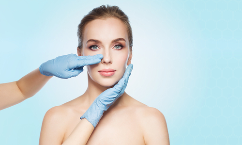 Young Woman Having Nose Examined